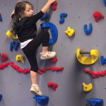 BH girl climbing wall_enhanced